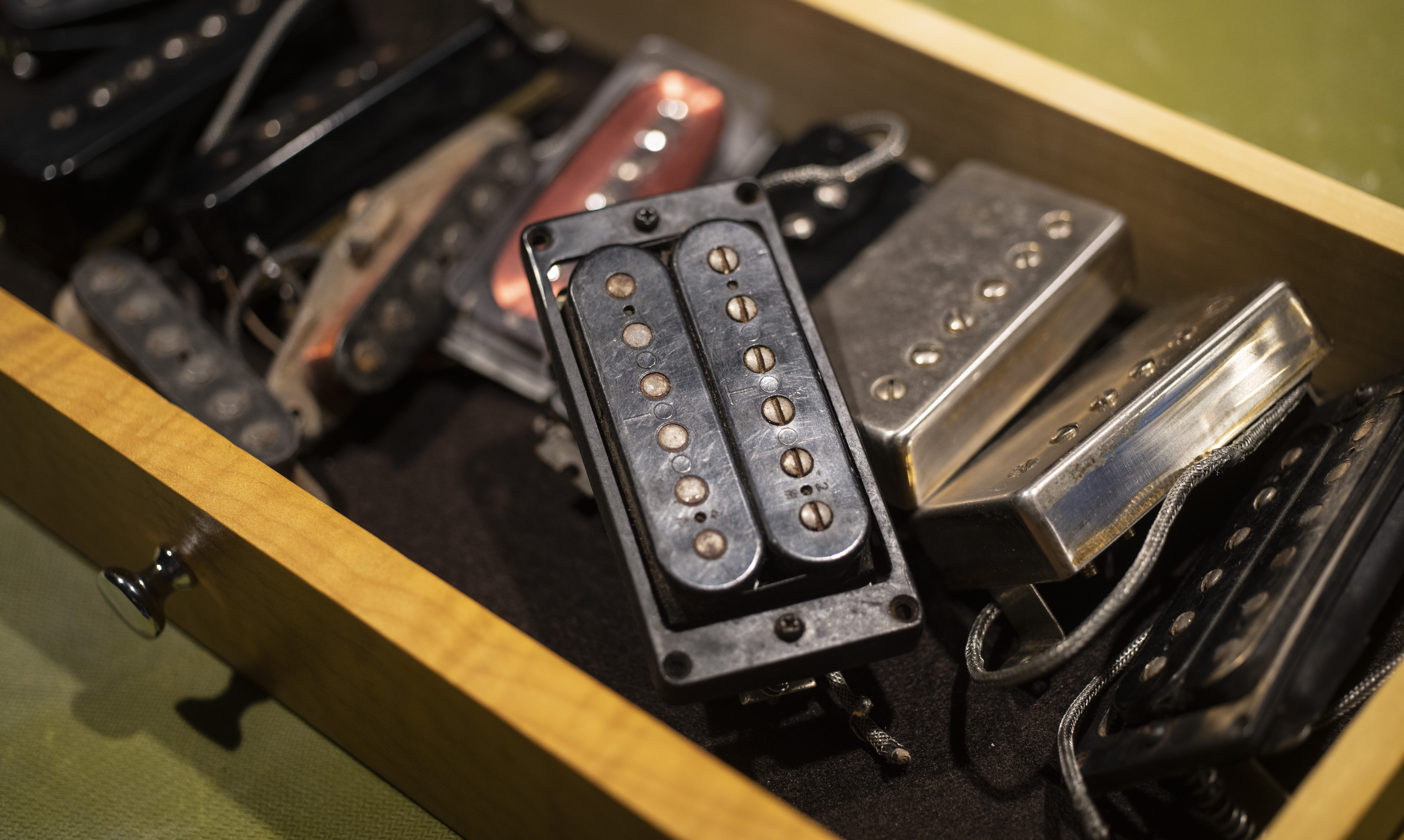 Collection of vintage pickups in a box