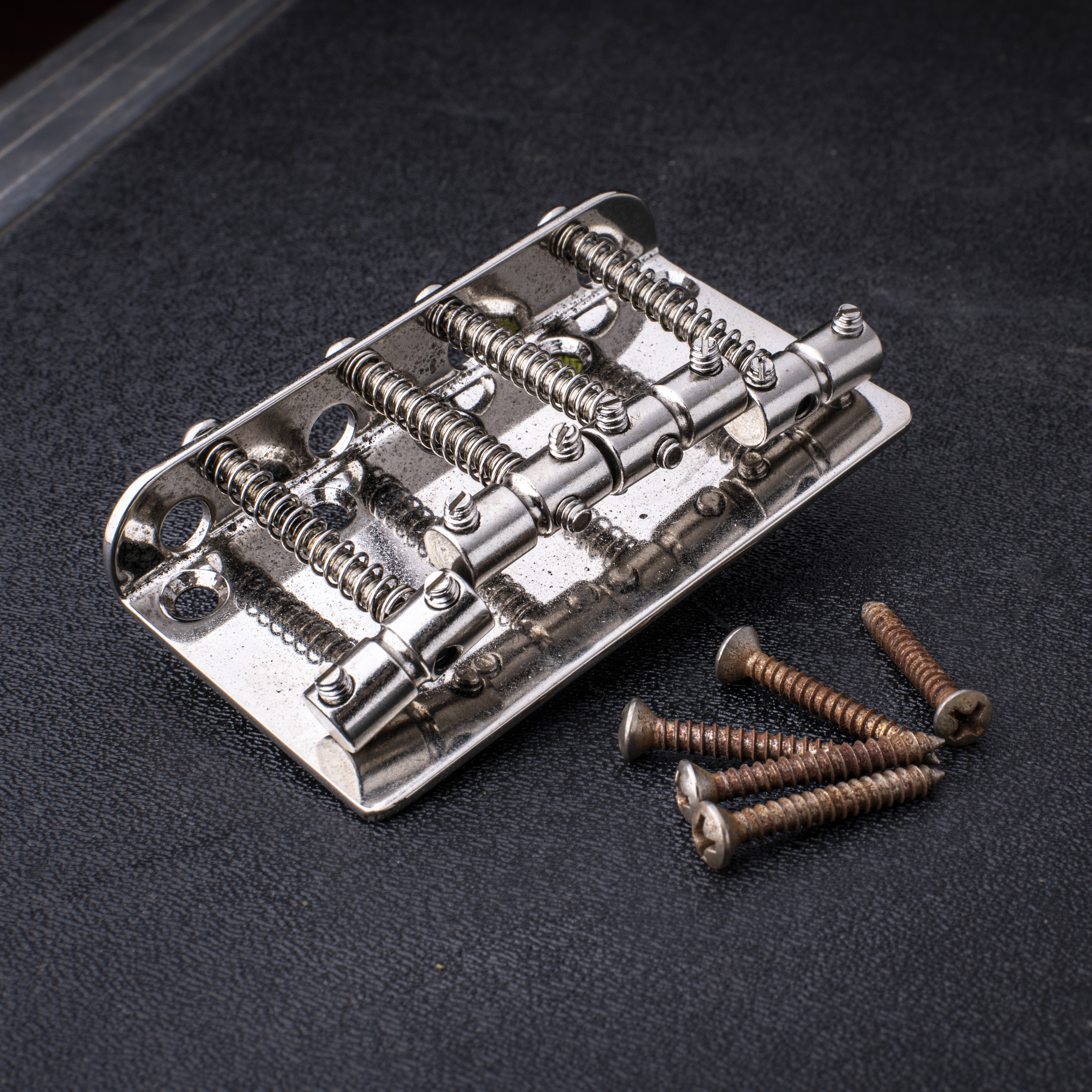 GuitarSlinger Cryocated Aged 4-String Bass Bridge with Grooved Barrel Saddles