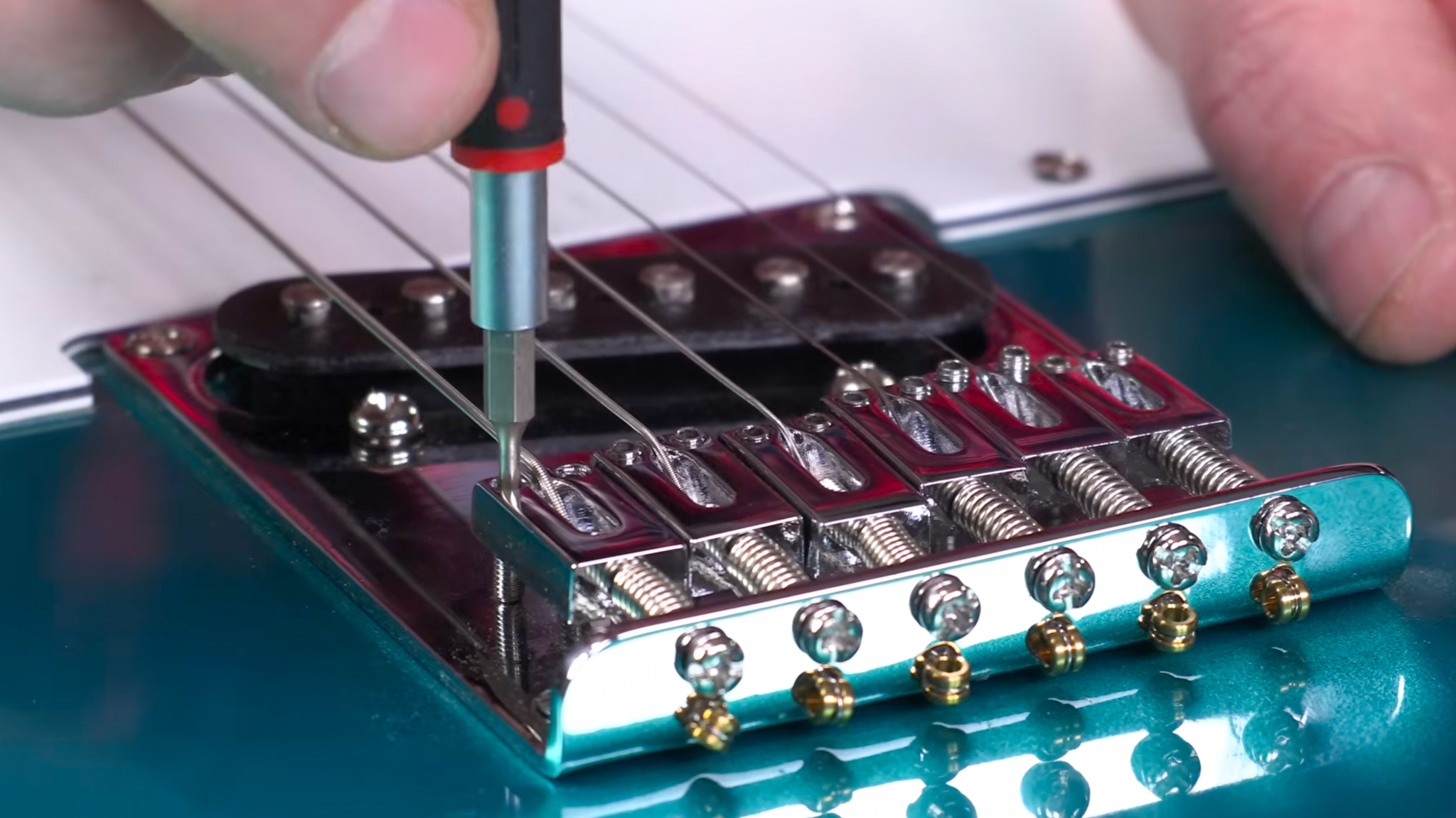 How to Adjust the Action on an Electric Guitar