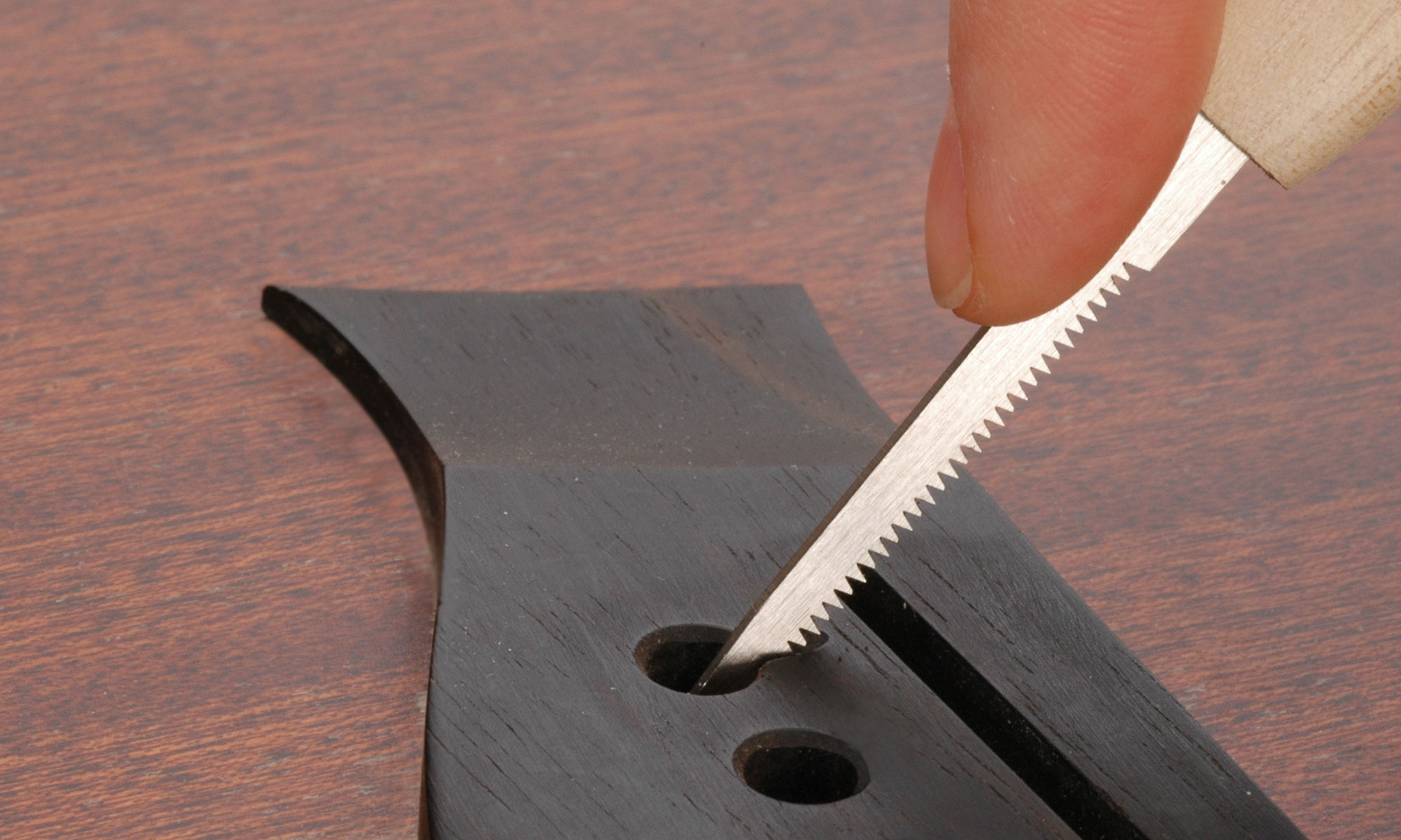 Bridge Pin Hole Slotting