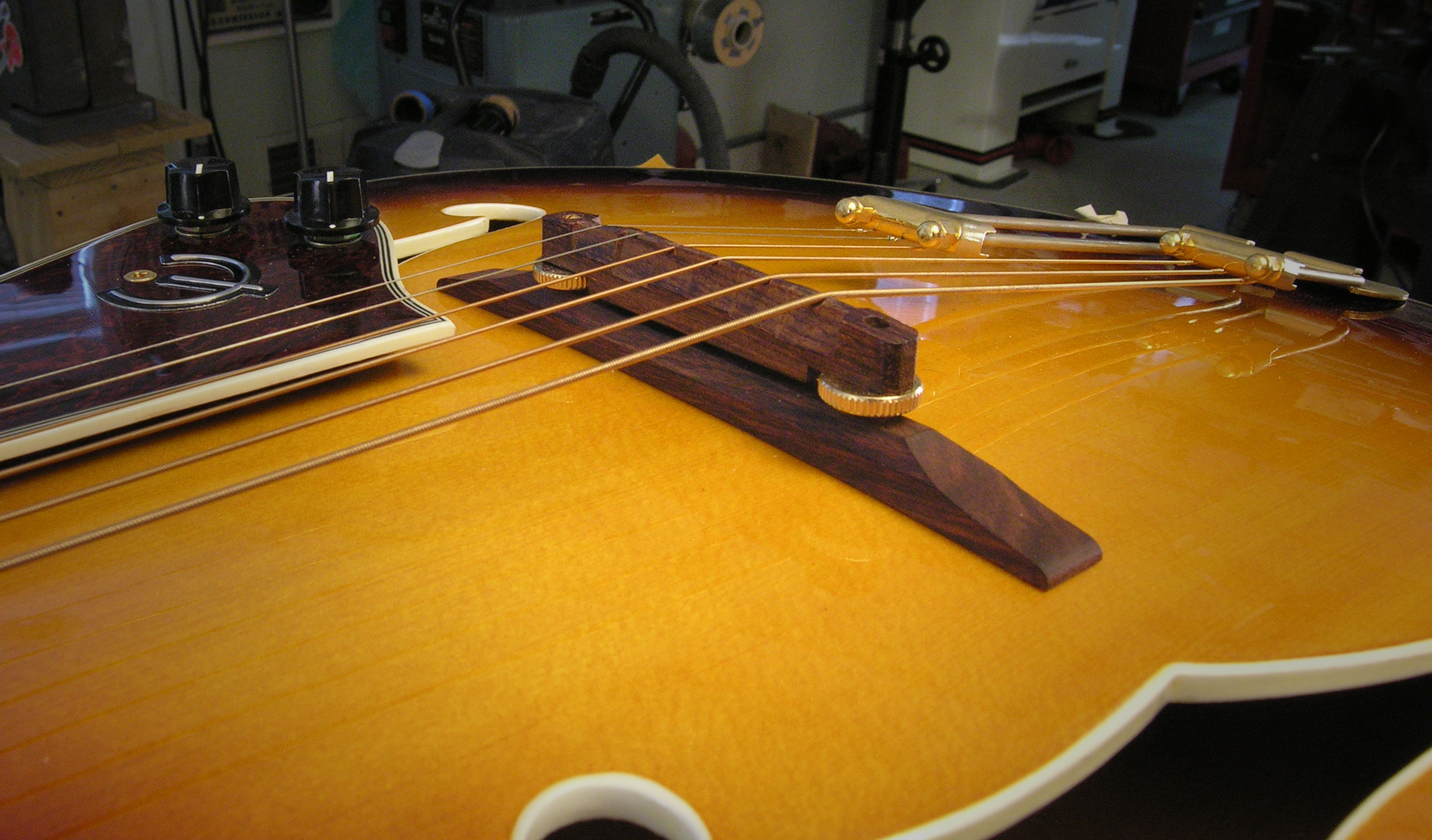Fitting an archtop bridge, easily and accurately