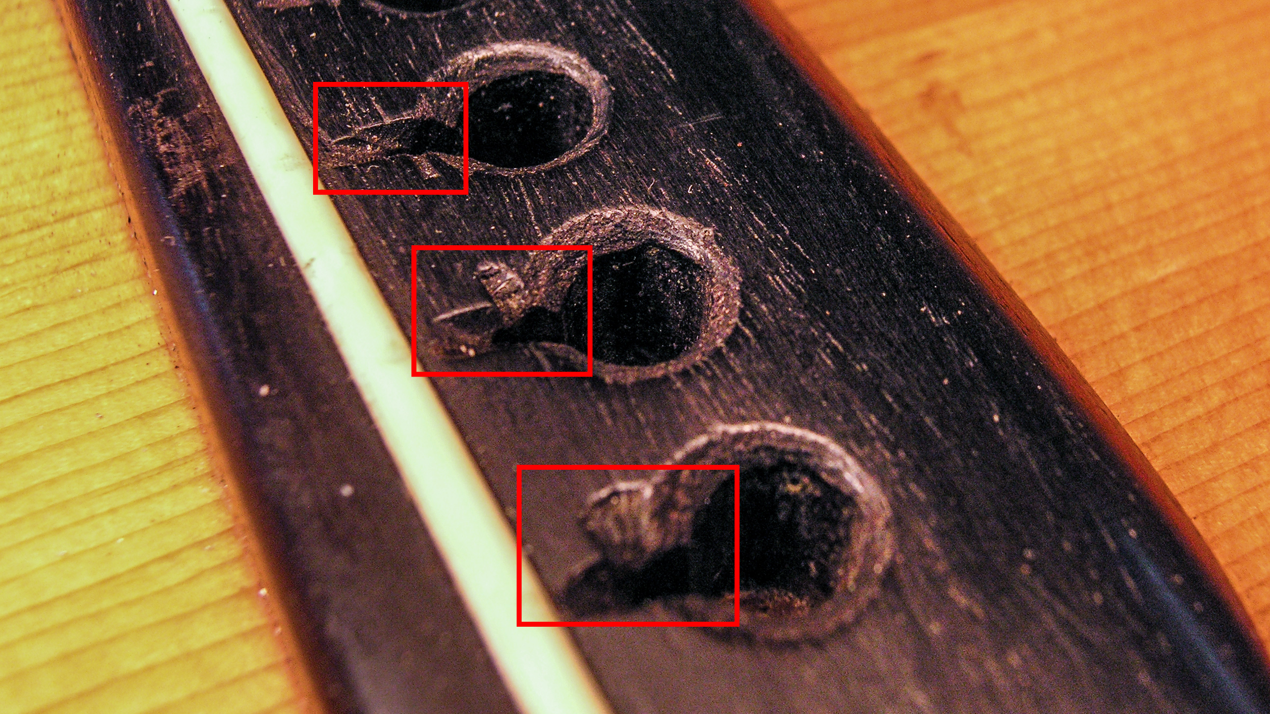 Fixing a 1937 Martin bridge. The first step is fixing a sandwich!