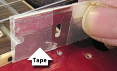 Putting tape on a razor