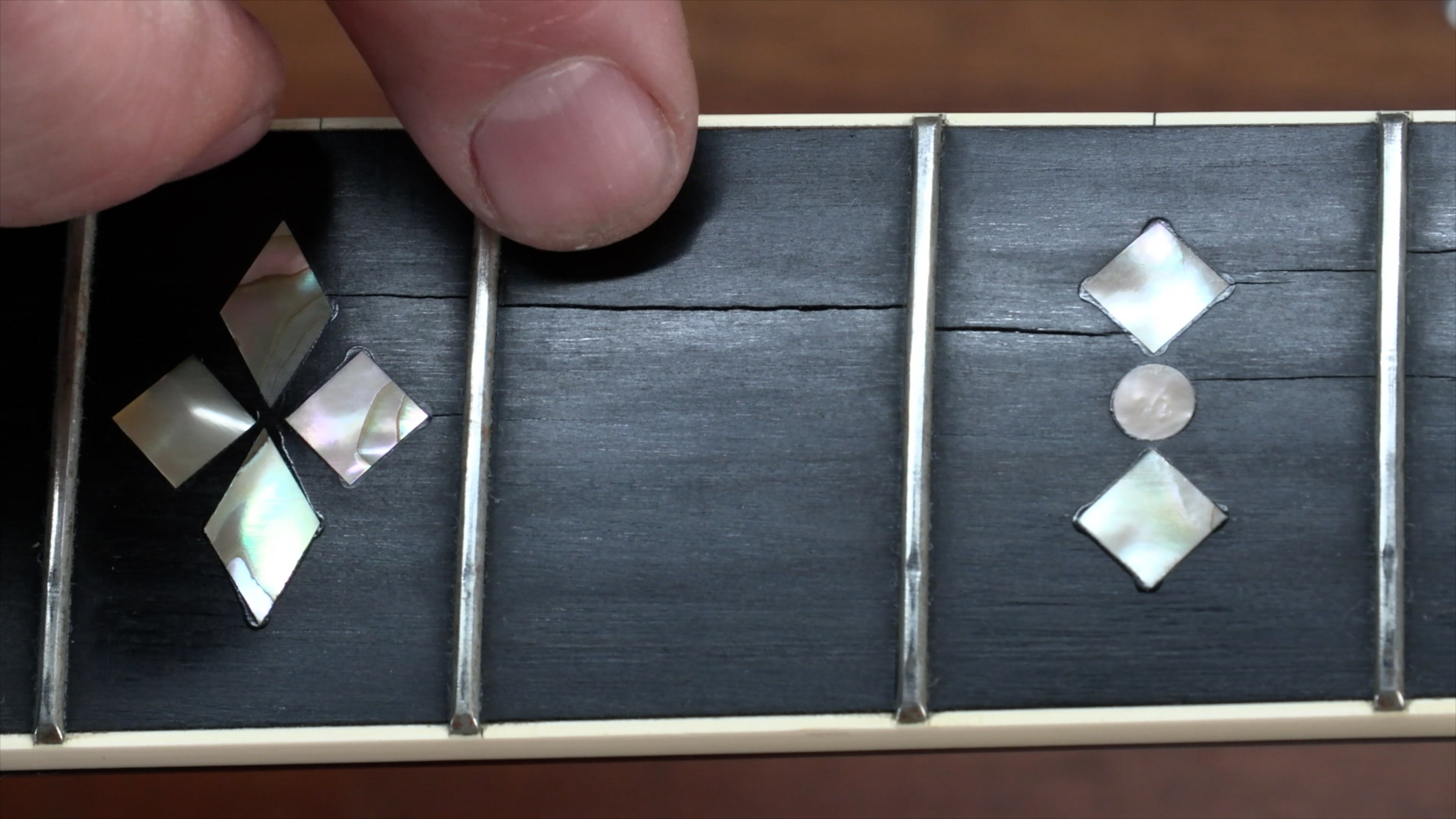 Simple Trick for Repairing Cracks on a Guitar Fretboard