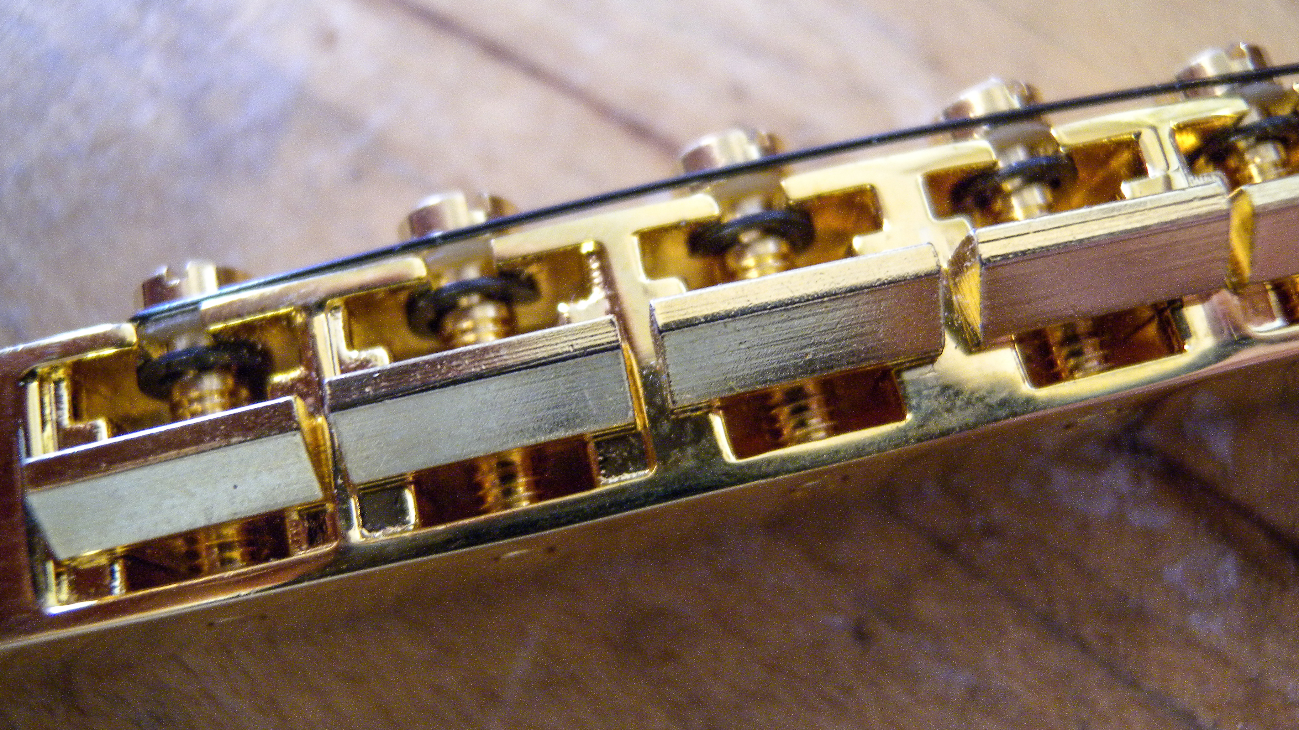 Are you supposed to slot Tune-o-matic bridge saddles?