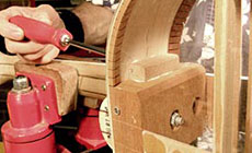 Screwing into the guitar's support block