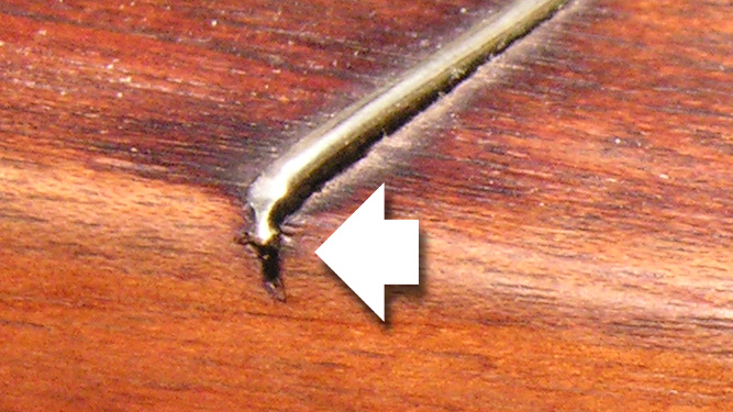 When dry air makes fret ends stick out, here's the fix
