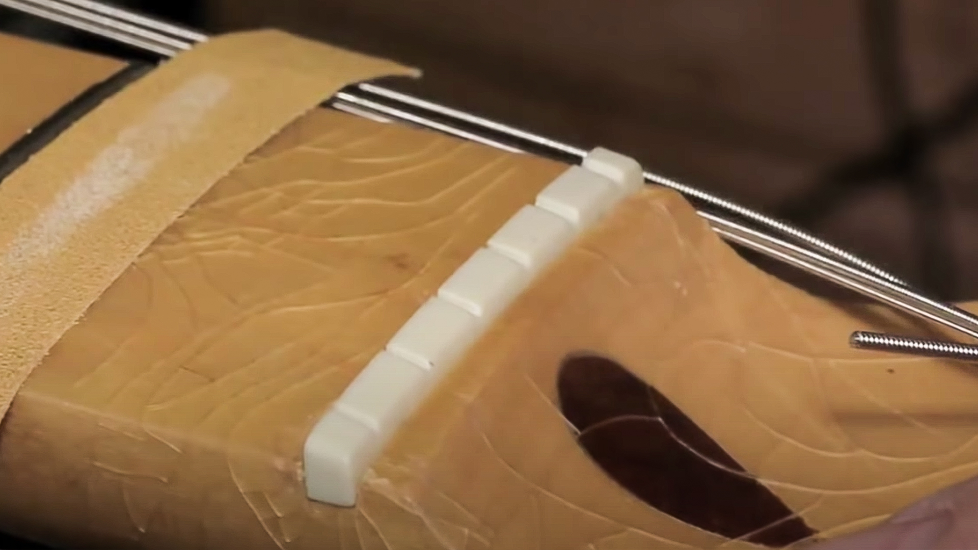 How to fit a preshaped nut on a guitar