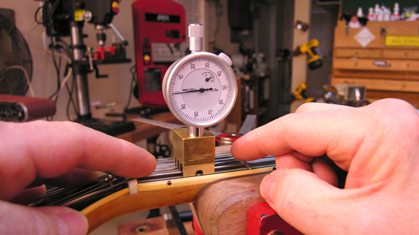 Putting the new Nut Slotting Gauge to work on a "burn victim" guitar
