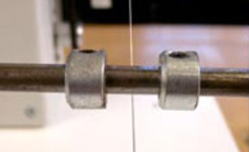 Traverse limiter and pickup wire