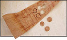 Plugs with bent scrap of wood