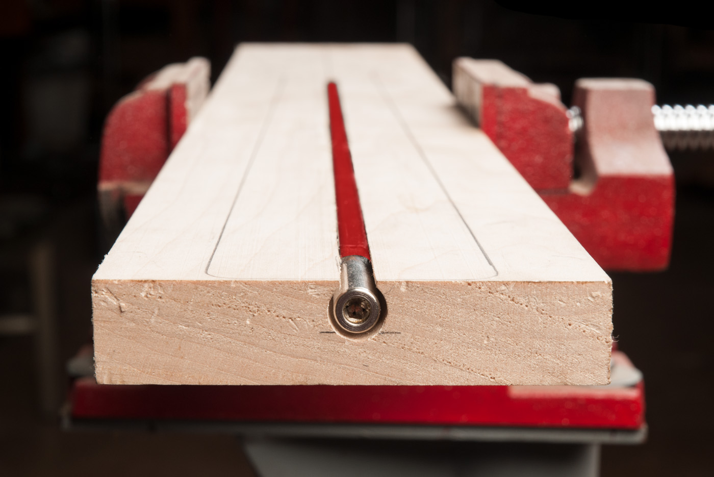 Neck blank in vise with truss rod installed