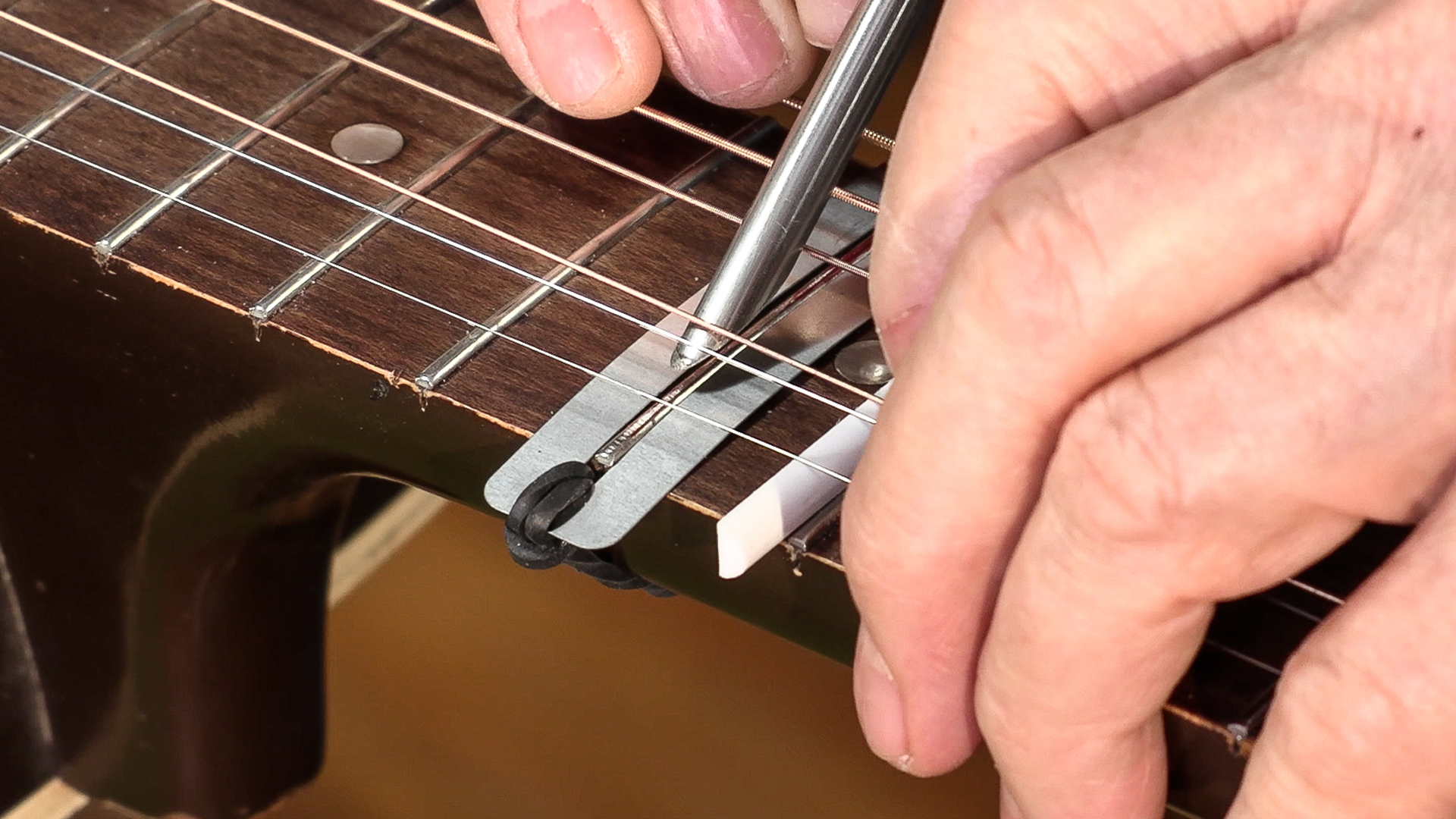 Fix Fret Buzz with the Strings On!