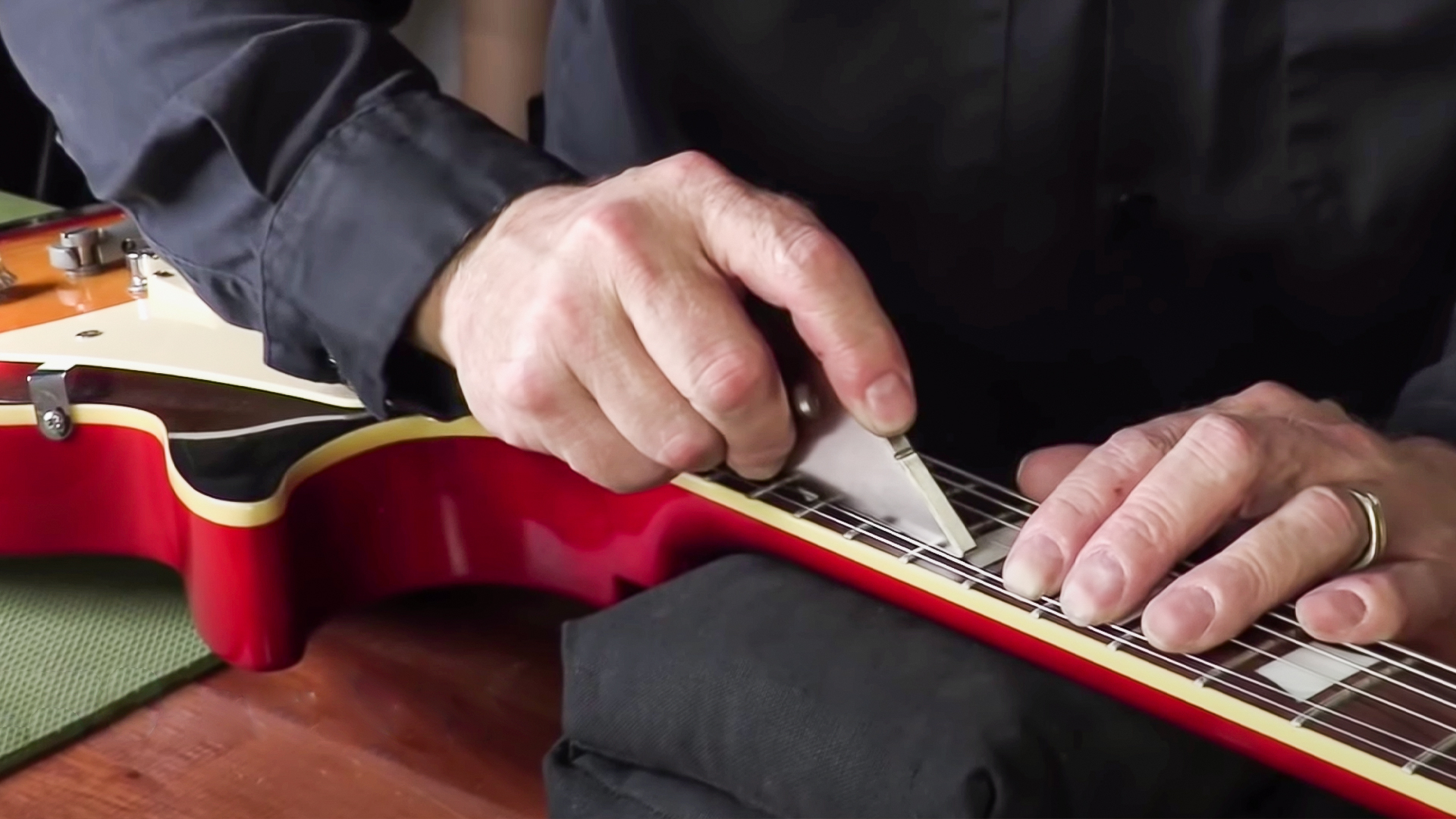 Spot leveling one fret at a time with the Fret Kisser