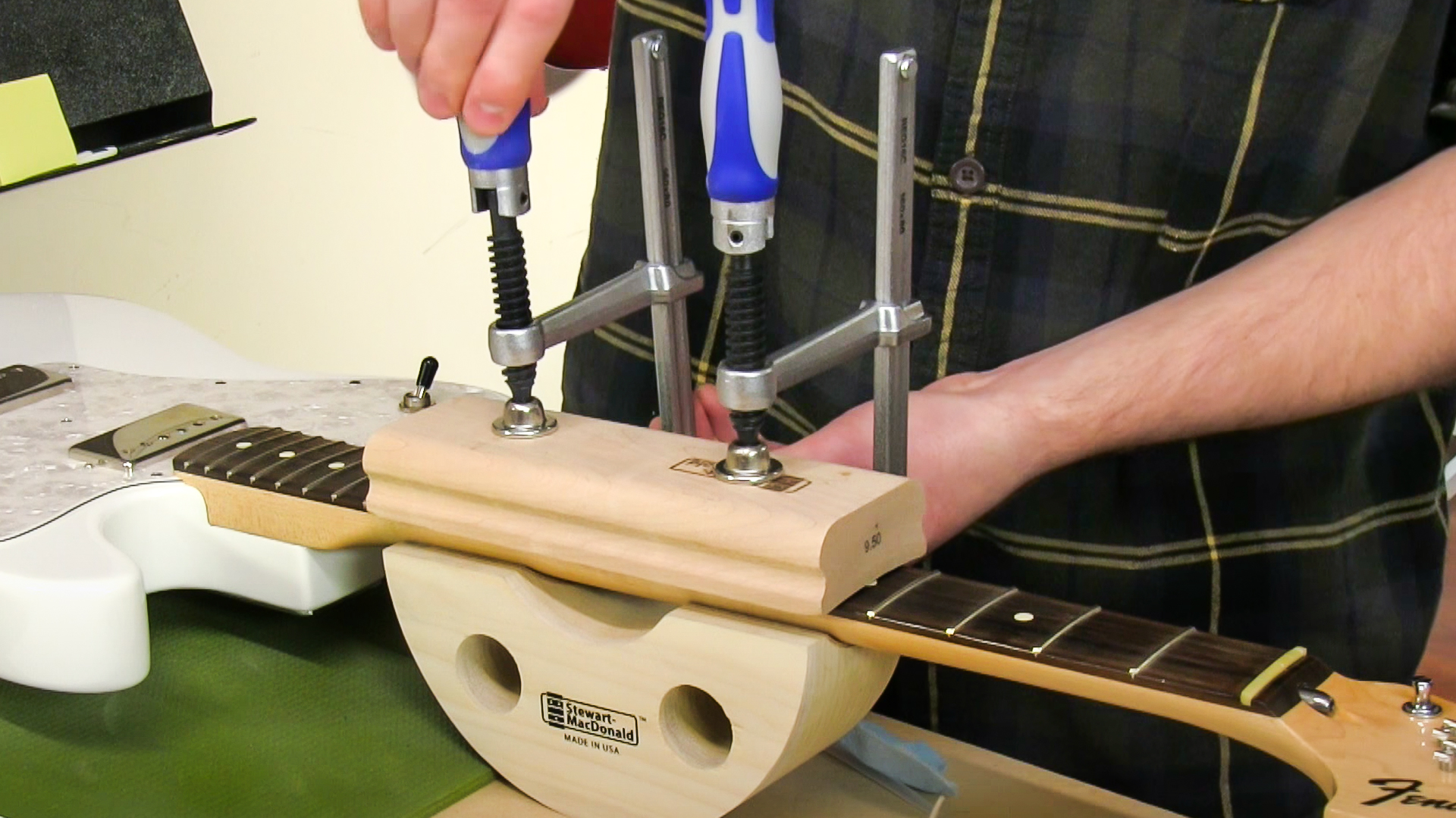 Fixing fret buzz: seating a popped-up fret