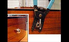 Screwing the strap button