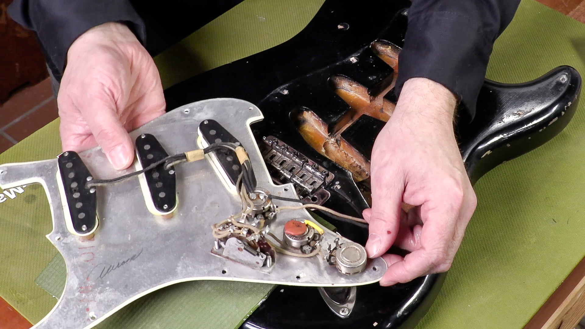 Is this '62 Strat genuine and all original?