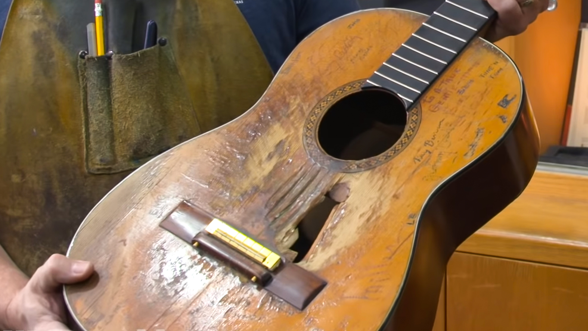 Repairing Willie Nelson's Trigger guitar