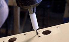 Reamed the pegholes so they&rsquo;ll fit the Grover tuners